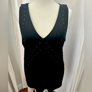 Black Trouvé tank with grommets.